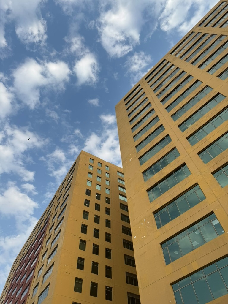 Office towers against a blue sky