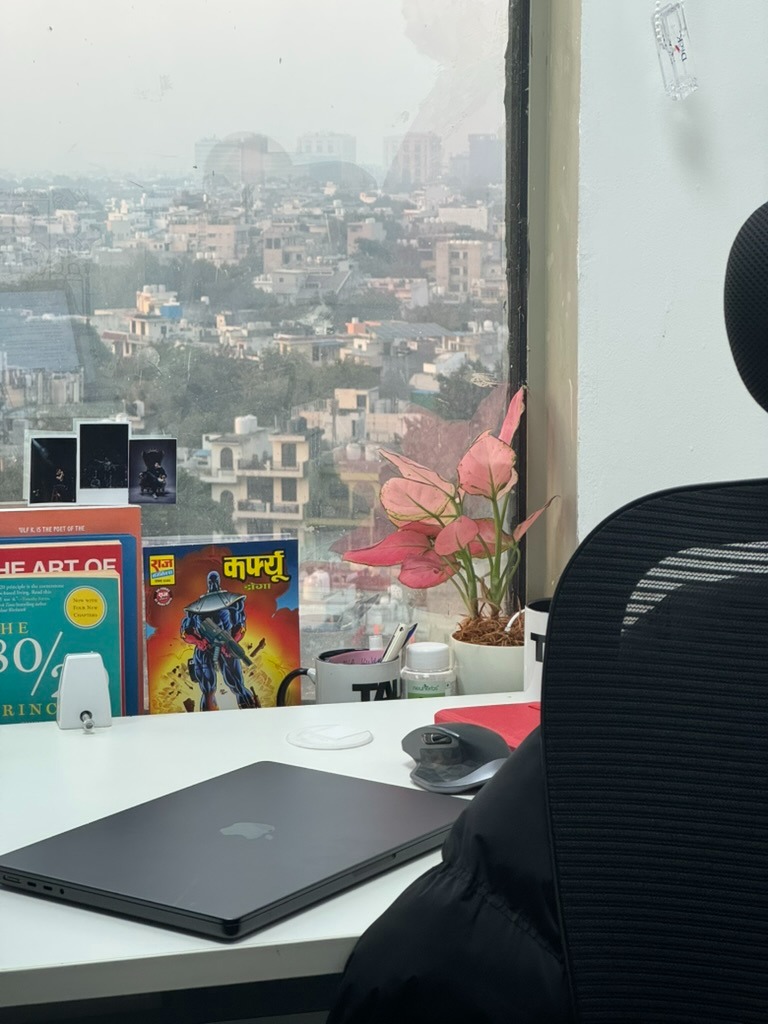 Office window view with books and comics